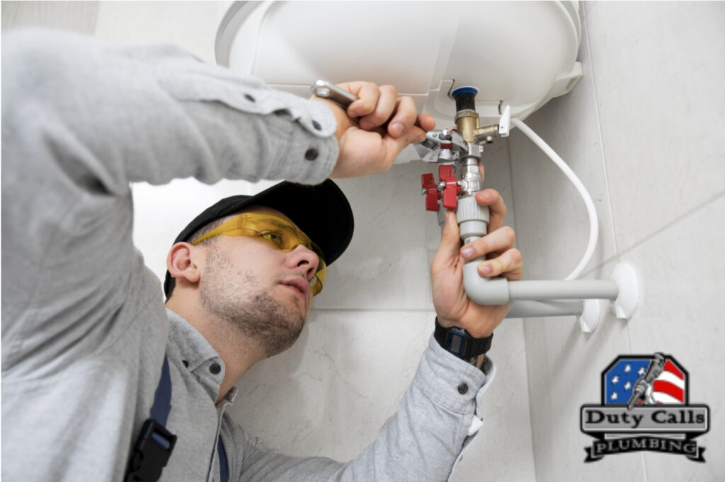 plumber repairing a pipe